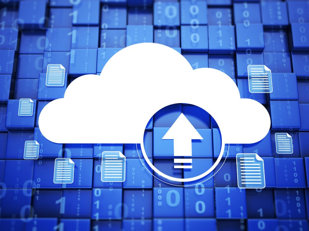 Ícone de nuvem com seta de envio de arquivos representando upload, elemento essencial para compreender a diferença de download e upload.