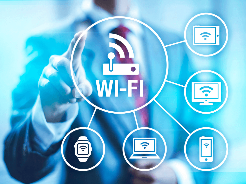 Interface destacando uma rede Wi-Fi conectando notebook, smartphone, tablet e relógio inteligente sem uso de cabos.